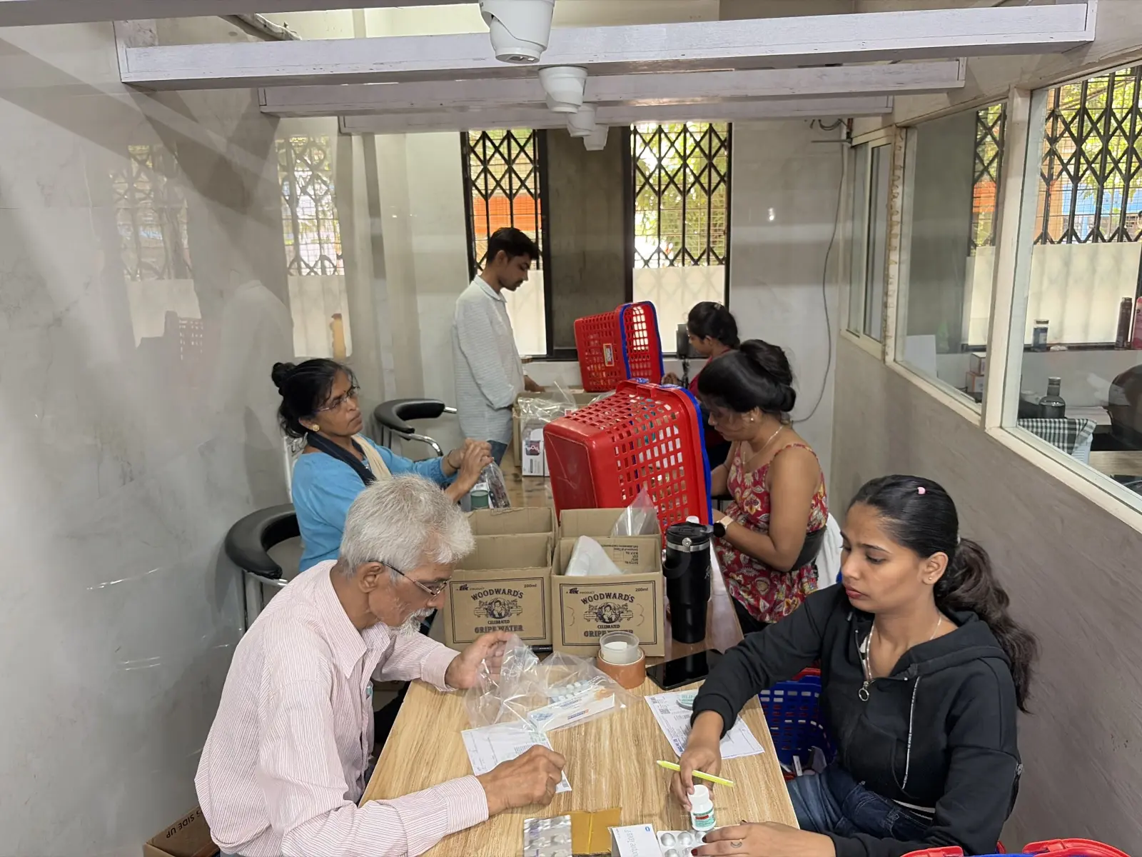 Warehouse logistics team preparing goods for dispatch coordination